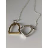 Delicate silver steed two stirrups necklace with gold and silver interlocking stirrups pendant on fine chain