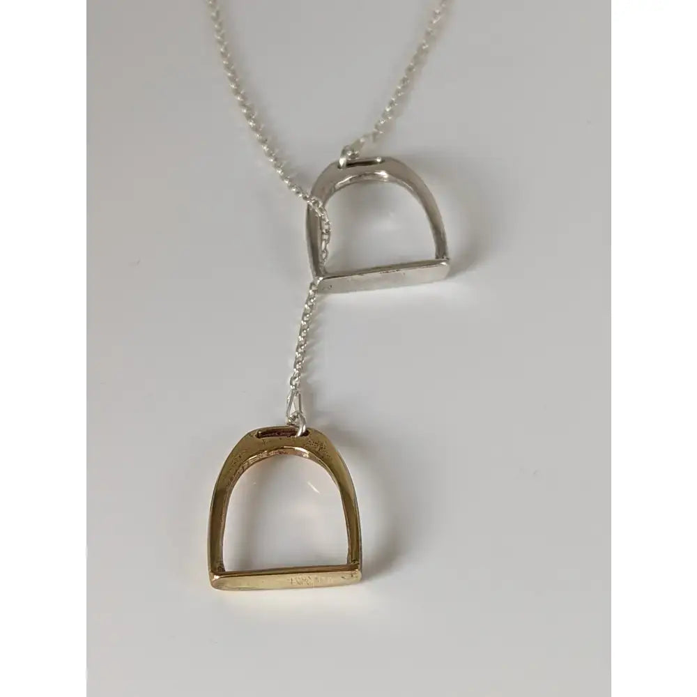Silver steed equestrian jewelry featuring a delicate silver and gold two stirrups necklace with a fine chain