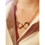 Silver steed two stirrups necklace gold-toned infinity symbol necklace with sleek open design in equestrian jewelry style