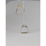 Silver steed equestrian jewelry featuring a polished silver two stirrups necklace with sleek minimalist design