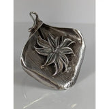 Silver steed unique silver leaf pendant with raised starburst design and textured surface in extravagant leaf rings style