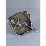 Silver steed unique silver leaf-shaped brooch with intricate rose and floral embossing, matching extravagant leaf rings