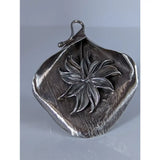 Silver steed unique silver leaf-shaped pendant with raised starburst design perfect for extravagant leaf rings lovers