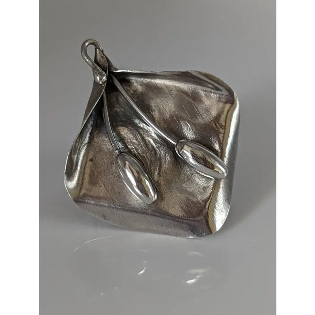 Silver steed unique silver-toned hand-forged pendant with textured square base and elongated spoon-like details