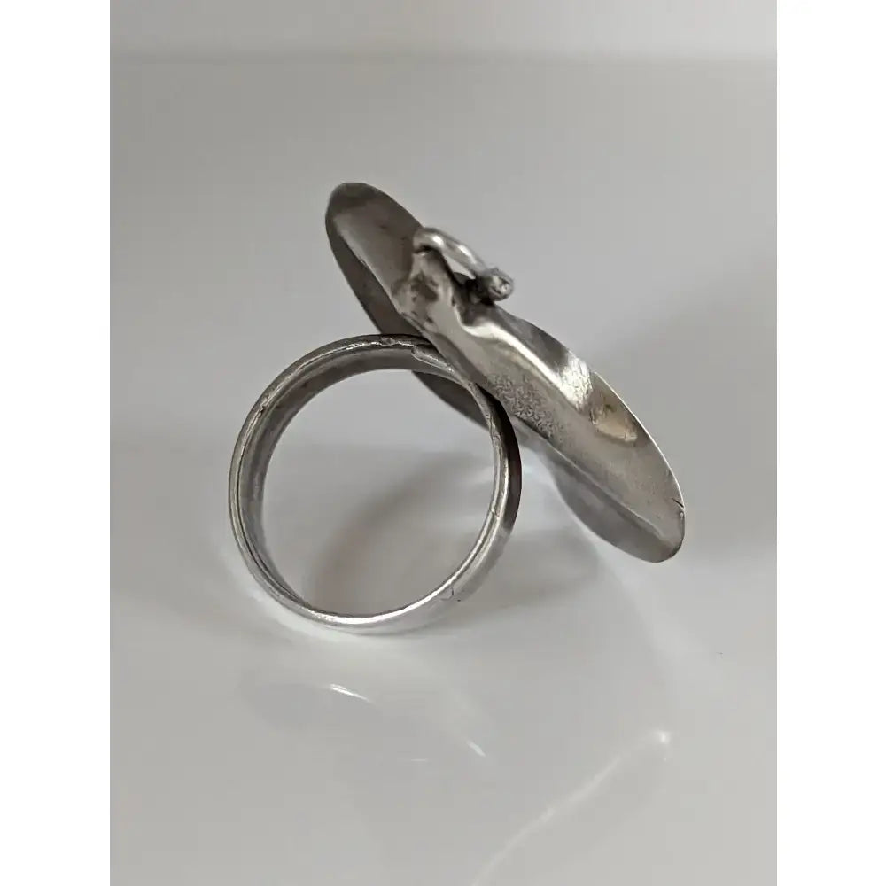 Silver steed unique silver steed unique extravagant leaf ring with textured hammered disc and small animal figurine detail