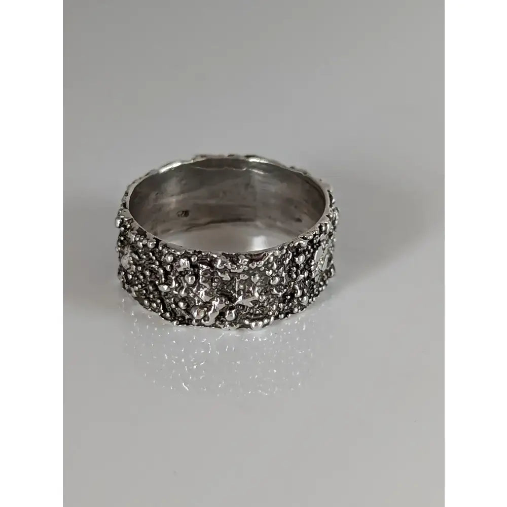 Silver steed unique textured silver ring with a bumpy organic surface crafted as a unique structure ring