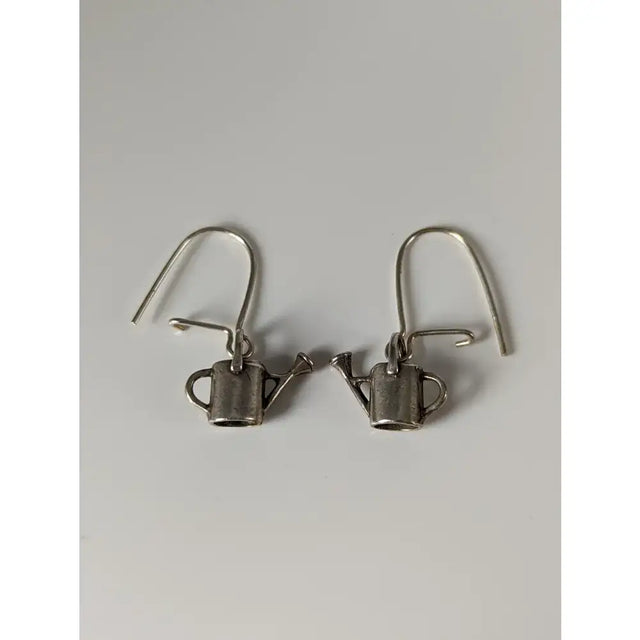 Silver steed watering can silver dropped earrings feature handmade silver mini watering cans with detailed spout and handle