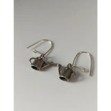 Silver steed silver dropped earrings featuring handmade silver miniature watering can charms with delicate hooks