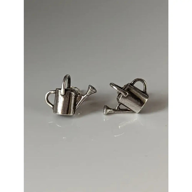 Silver steed watering can stud earrings featuring silver toned miniature charms with detailed handles for horse lovers
