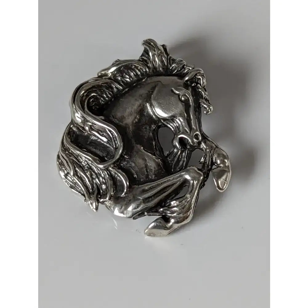Silver steed wild horse silver charm with detailed silver horse head ring featuring flowing mane and intricate face details