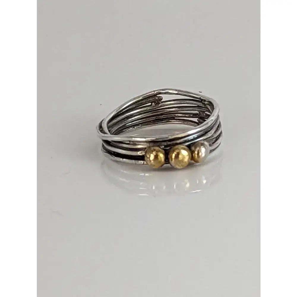 Silver steed silver wired band ring with brass balls in silver and gold multi strand design with three beads