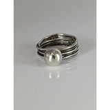 Silver steed hand-made silver ring with a wired band and large polished silver ball centerpiece