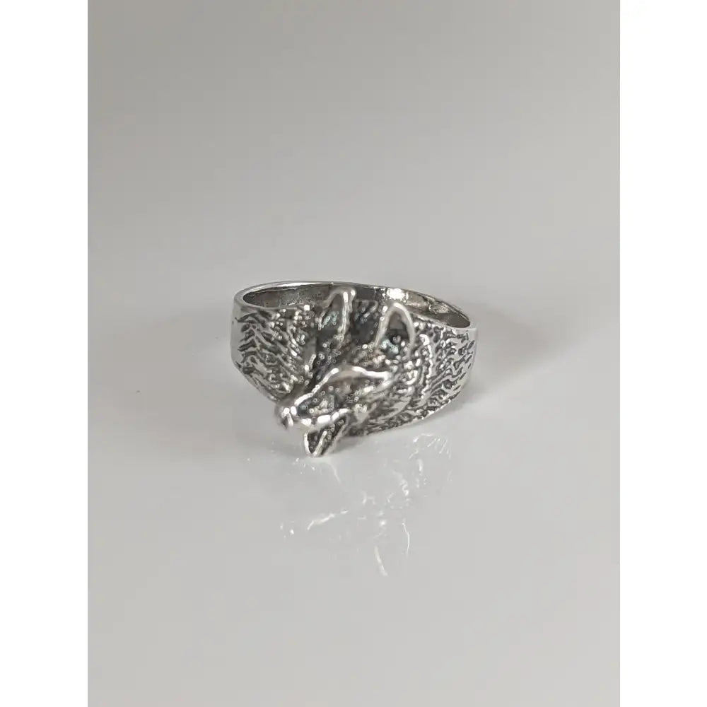 Silver steed wolf silver ring with silver fox head and intricate detailing on textured band wolf silver ring