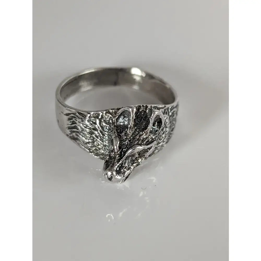 Silver steed wolf silver ring with textured fur details and polished metallic finish in a wolf silver ring design