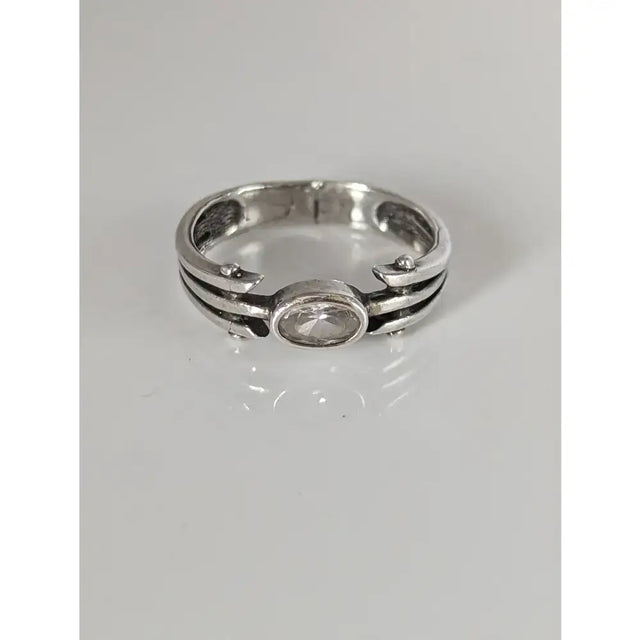 Silver steed silver zirconia antique ring featuring an oval-cut clear stone and multi-band intricate silver design