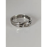 Silver steed zirconia antique ring with a clear oval-cut gemstone and an intricate layered silver band design