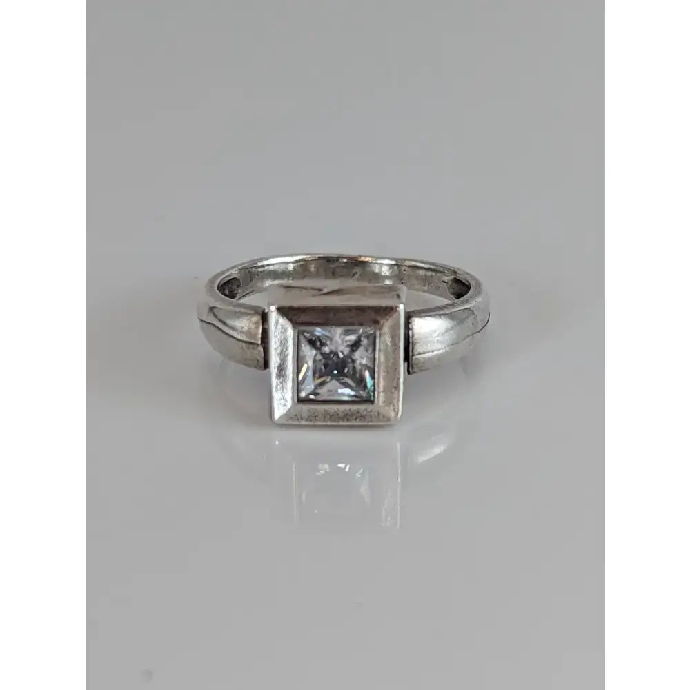 Silver steed zirconia silver ring featuring a square zirconia stone set in a sleek modern angular band