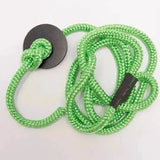 Bright green braided silvermoor swingers rope with black circular attachment and small tag in swingers rope kit