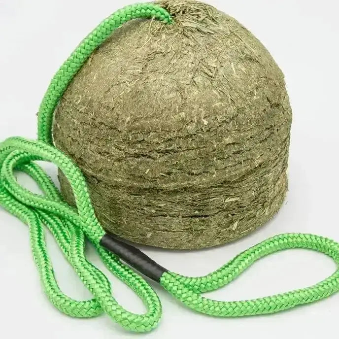 Green rope leash attached to round textured hay ball from silvermoor swingers rope kit for swinger horse treats