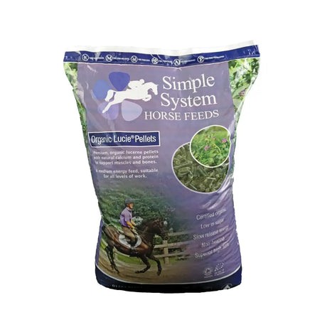 A purple and blue bag of simple system horse feeds organic lucie pellets with a white jumping horse silhouette on front