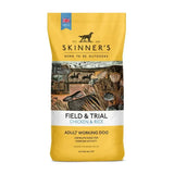 Yellow bag of skinners field & trial chicken & rice complete working dog food for adult dogs