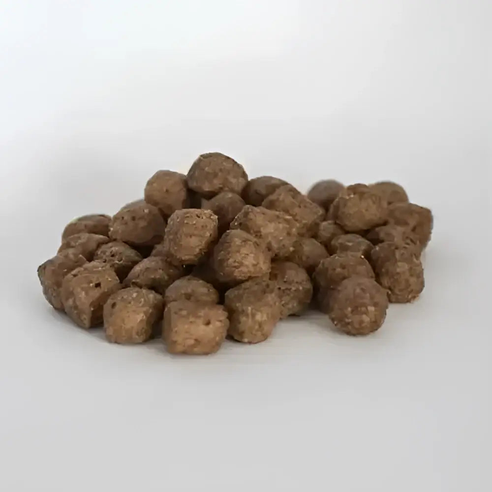 Brown textured kibble pellets from skinner’s field field and trial sensitive range dog food with duck and rice