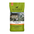 Green skinners field trial junior complete dry dog food bag with vintage stone house and dogs illustration
