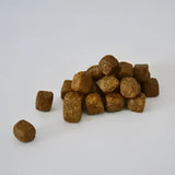 Brown rectangular kibble from skinners field and trial working dog food for highly active dogs and working dog food