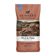 A brown bag of skinners field & working trial 23 complete working dog food with rustic horse and rabbit illustrations