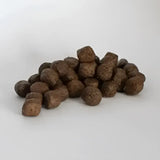 Brown textured kibble pellets of skinners grain free chicken and sweet potato trial grain free recipe dog food