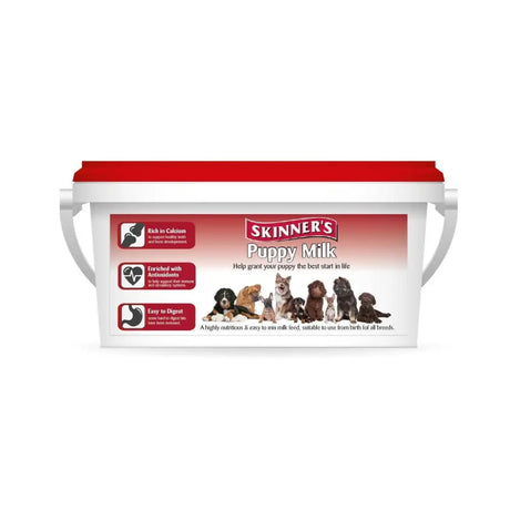 White plastic bucket with red lid and handles labeled skinners puppy milk complete milk substitute with puppy images