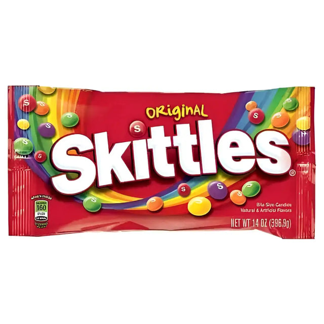 A vibrant red packet of skittles original candy with rainbow graphics perfect for tuck shop sweet treats