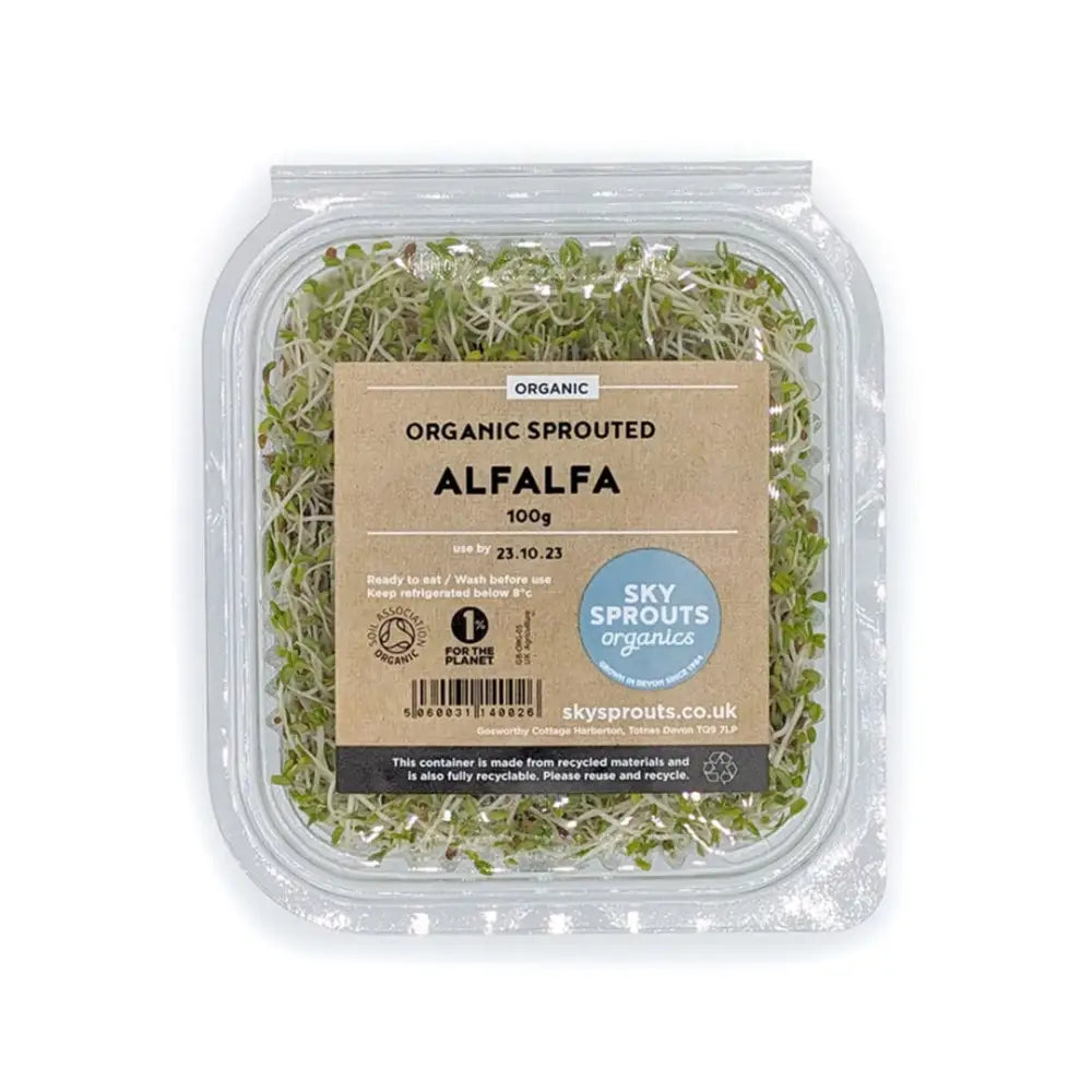 Sky sprouts organic alfalfa sprouts in a clear plastic container with a brown paper label provide fresh and healthy greens