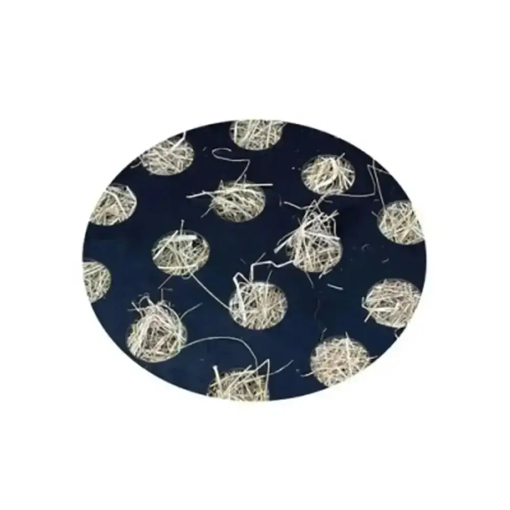 Dark blue oval spare grazing grid mat with light beige tangled fiber circles for slo-grazer circular holed grazing grid