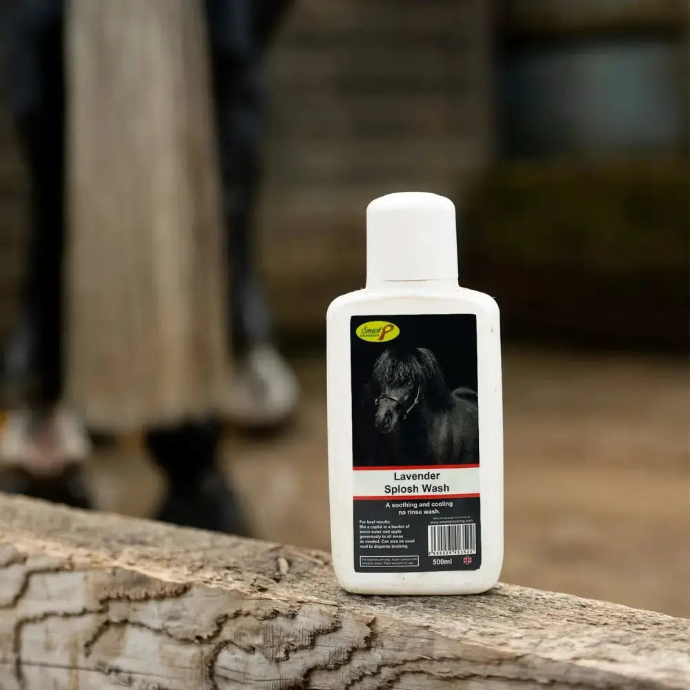White plastic bottle of smart grooming lavender splosh wash soothing cooling hoof wash for horses