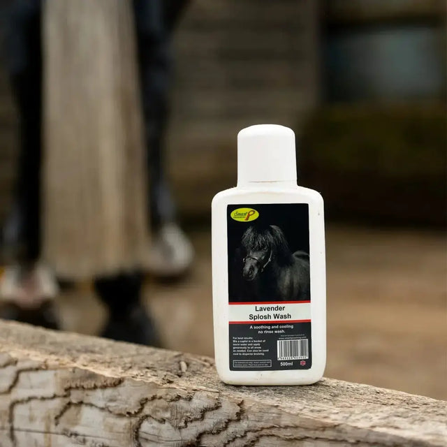 White plastic bottle of smart grooming lavender splosh wash soothing cooling hoof wash for horses