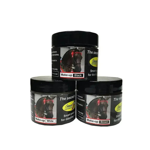 Three cylindrical jars of smash grooming smart grooming colour make up in black white and brown for enhancing gloss