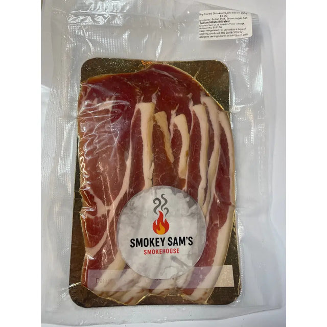 Packaged smokey sam’s dry cured smoked back bacon slices with marbled red and white fat on a gold tray