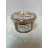 A clear plastic container with a ridged lid holding smokey sam’s smoked paprika featuring a white label and red branding
