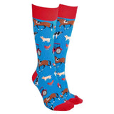 Bright blue knee-high socks with red cuffs featuring horses cows pigs tractors and chickens from sock society farmyard collection unisex