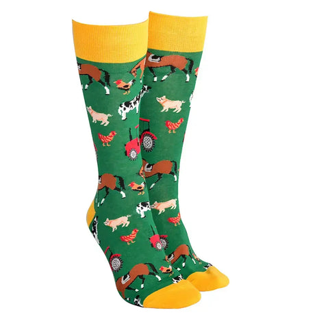 Green and yellow farm-themed socks featuring cartoon animals and a red tractor from sock society farmyard collection unisex pack