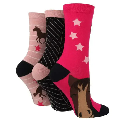 Bright pink sockshop wild feet cotton crew socks with fun animal-themed horse face and white stars design