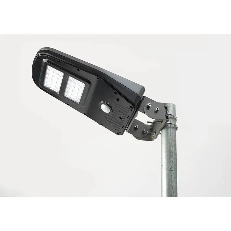 Black solar-powered led street light with two rectangular panels and motion sensor from solar technology arena2k led features timed illumination mode