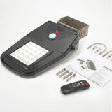 Black solar technology arena2k led outdoor light with motion sensor led panel and sleek plastic housing in timed illumination mode