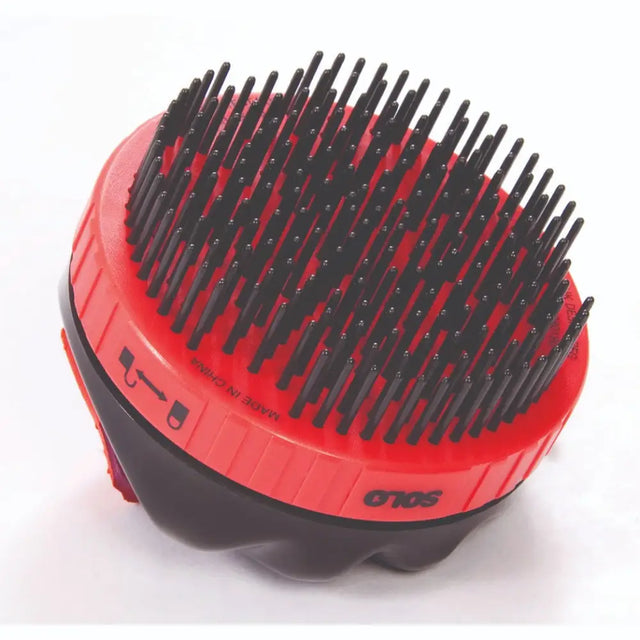 Red and black SoloComb retractable brush with dense stiff bristles for hygienic twist brush hair care and easy brushing