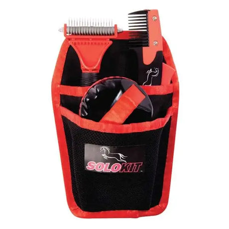 Red and black solokit horse grooming kit with mesh body and handy holster holding combs brushes and clippers and trimmers