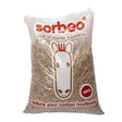A clear bag of sorbeo wood pellets brown cylindrical mighty pine horse bedding made from compressed wood fibers