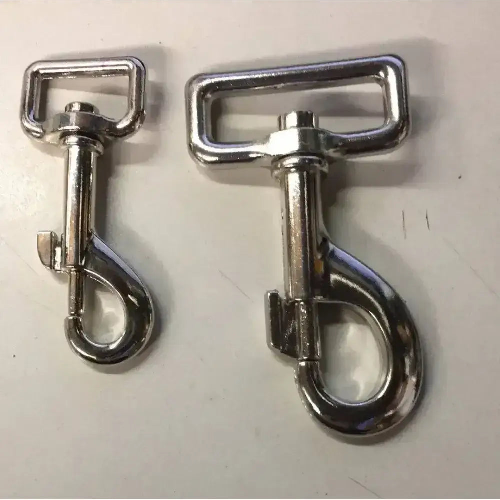 Two shiny silver metal horse rug clips with spring loaded trigger and rectangular handles for secure fastening