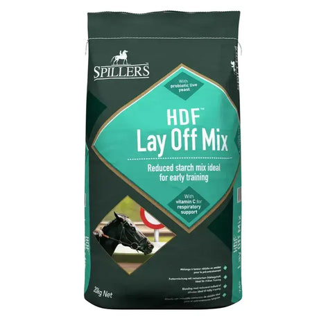 Dark green bag of spillers lay off mix horse feed with teal label and black horse head for early training equestrian use