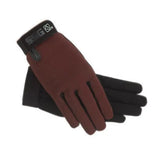 A pair of black ssg riding gloves showing the back side designed for all weather childs riding gloves use